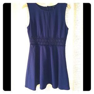 Navy blue dress with flowered design waist